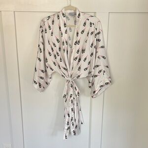 Elegant White Robe with Champagne Bottle Print